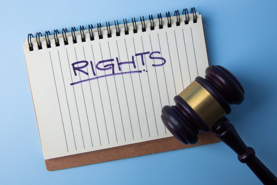 Notepad With Rights Text And A Judge Gavel On Blue