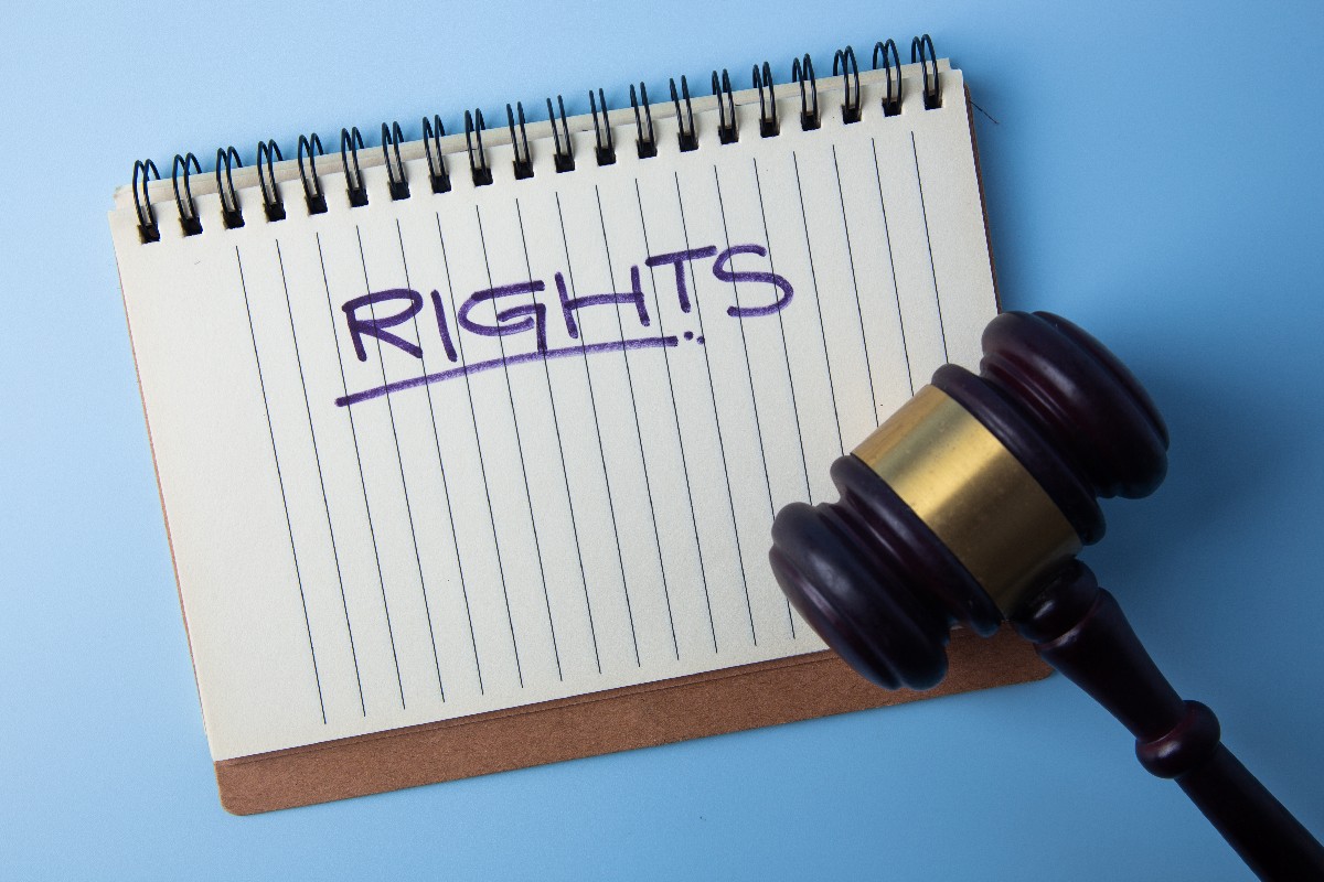 Notepad With Rights Text And A Judge Gavel On Blue